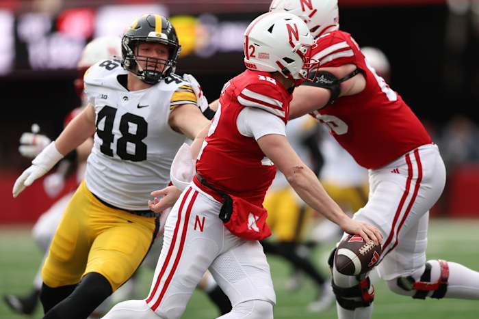 NU vs. Iowa 2023 - Max Llewellyn chases Chubba Purdy